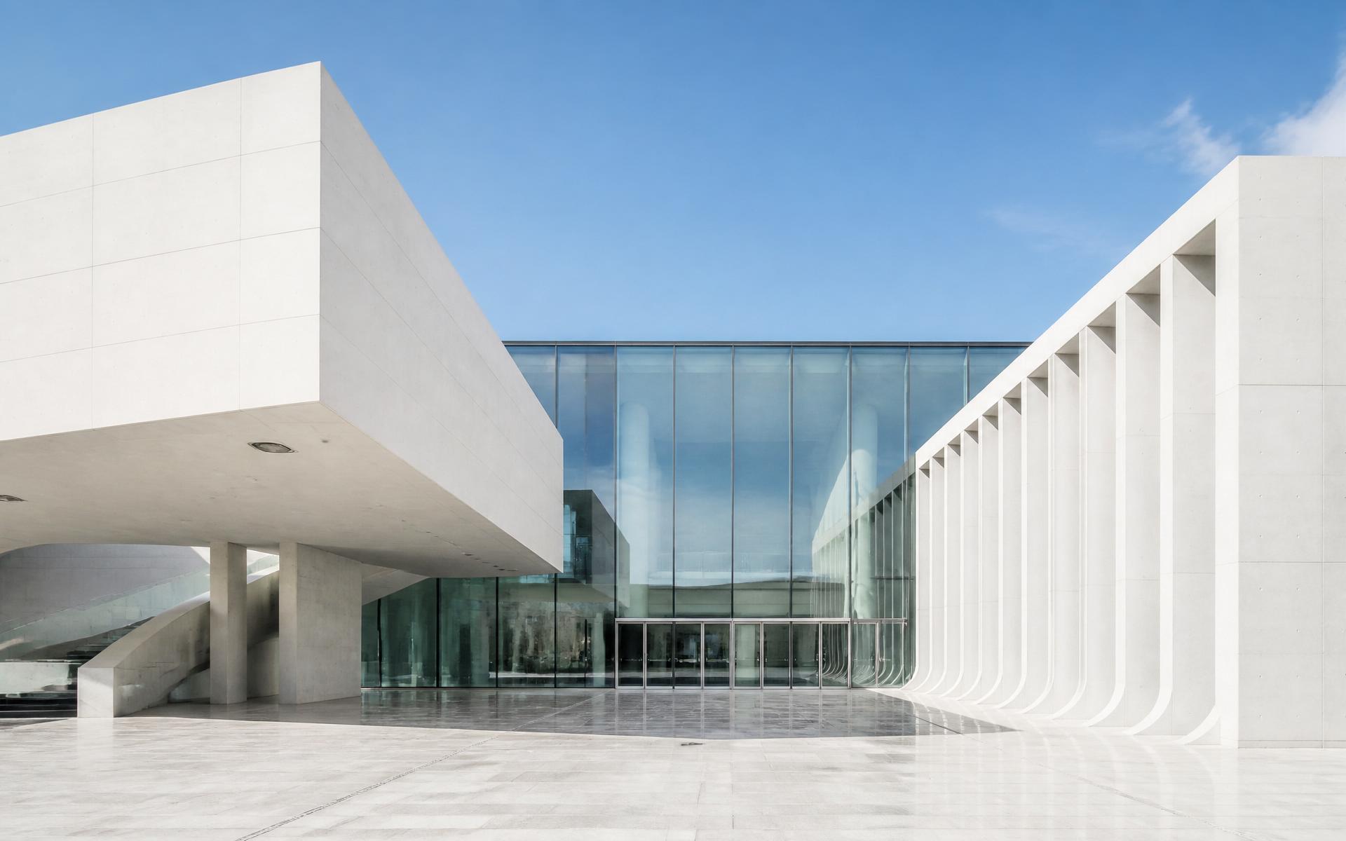 Contemporary architectural composition of concrete and glass